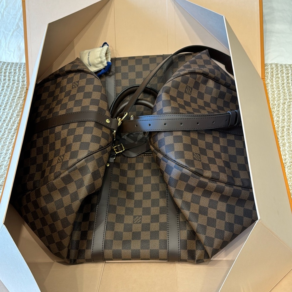 Louis Vuitton 55 duffle bag new condition